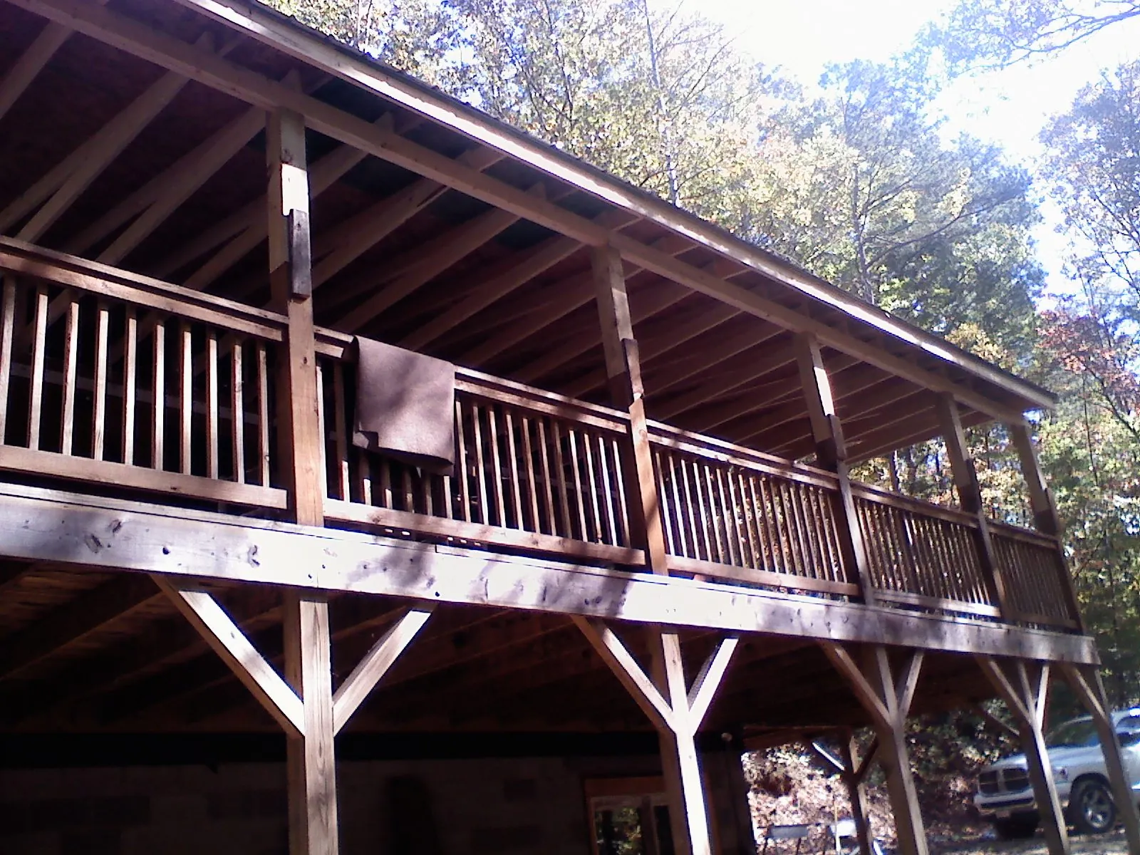 Timber framing under a new elevated porch and deck — Roof Leak Repair in Norris by Roofing Brothers
